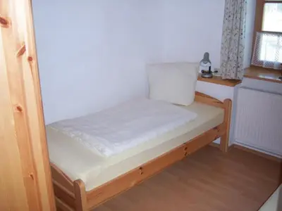 Ein Bett oder Betten in einem Zimmer der Unterkunft Irgenbauer