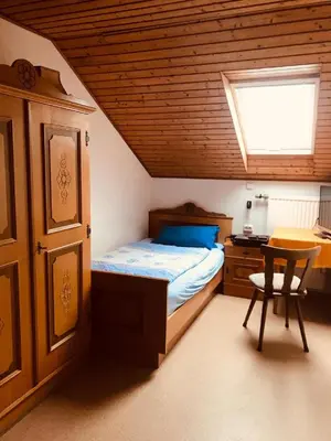 Ein Bett oder Betten in einem Zimmer der Unterkunft Gasthaus Felbermaier