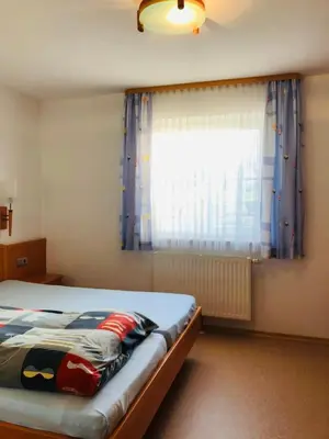 Ein Bett oder Betten in einem Zimmer der Unterkunft Gasthaus Felbermaier
