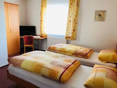 Ein Bett oder Betten in einem Zimmer der Unterkunft Gasthaus Felbermaier