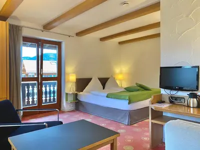 TV/Unterhaltungsangebot in der Unterkunft Sonnhof Apartments Tegernsee - zentral und perfekt für Urlaub & Arbeit
