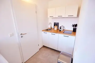 Küche/Küchenzeile in der Unterkunft Sonnhof Apartments Tegernsee - zentral und perfekt für Urlaub & Arbeit