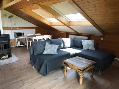 Ein Sitzbereich in der Unterkunft Ferienwohnung Nimscholz