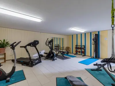 Das Fitnesscenter und/oder die Fitnesseinrichtungen in der Unterkunft Ferienwohnanlage Oberaudorf D3 mit Hallenbad und Sauna