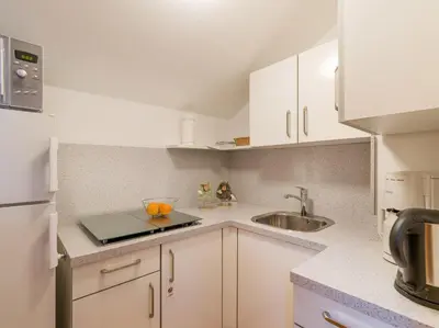 Küche/Küchenzeile in der Unterkunft Ferienwohnanlage Oberaudorf E7 mit 2 Schlafzimmer und Hallenbad