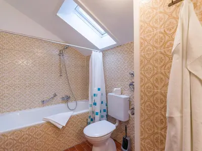 Ein Badezimmer in der Unterkunft Ferienwohnanlage Oberaudorf E7 mit 2 Schlafzimmer und Hallenbad
