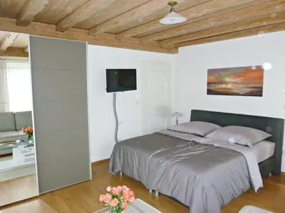 Ein Bett oder Betten in einem Zimmer der Unterkunft Ferienappartement in der Wolfsgrube-Rambichler