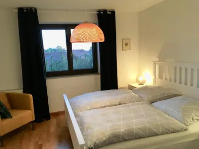 Ein Bett oder Betten in einem Zimmer der Unterkunft Haus Mali