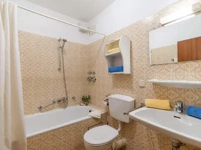 Ein Badezimmer in der Unterkunft FerienwohnanlageOberaudorf B5 mit Hallenbad und Sauna