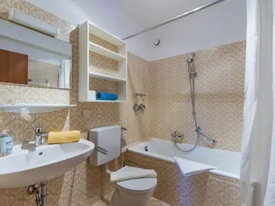 Ein Badezimmer in der Unterkunft Ferienwohnanlage Oberaudorf C 2 mit Hallenbad und Sauna