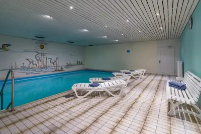 Der Swimmingpool an oder in der Nähe von Ferienwohnanlage Oberaudorf E1 mit Hallenbad und Sauna