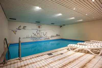 Der Swimmingpool an oder in der Nähe von Ferienwohnanlage Oberaudorf E5 mit Hallenbad und Sauna