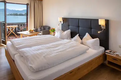 Ein Bett oder Betten in einem Zimmer der Unterkunft Gästehaus Grünäugl am See