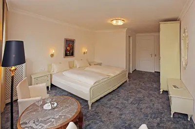 Ein Bett oder Betten in einem Zimmer der Unterkunft Hotel Rex