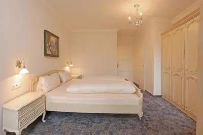 Ein Bett oder Betten in einem Zimmer der Unterkunft Hotel Rex