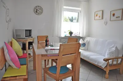 Ein Sitzbereich in der Unterkunft Gästehaus Bergkristall