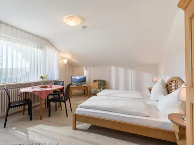 Ein Bett oder Betten in einem Zimmer der Unterkunft Ferienwohnanlage-Oberaudorf 1 Zimmer App E 8 mit Hallenbad und Sauna