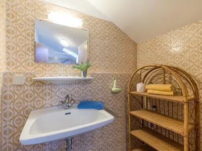 Ein Badezimmer in der Unterkunft Ferienwohnanlage-Oberaudorf 1 Zimmer App E 8 mit Hallenbad und Sauna