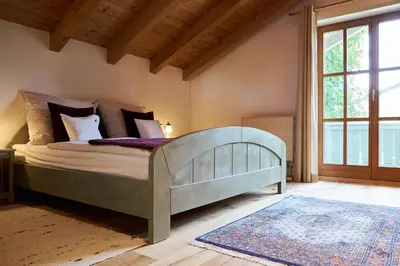 Ein Bett oder Betten in einem Zimmer der Unterkunft Ferienwohnung Hofmann