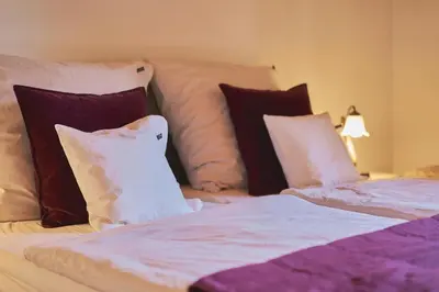 Ein Bett oder Betten in einem Zimmer der Unterkunft Ferienwohnung Hofmann
