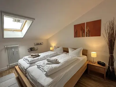 Ein Bett oder Betten in einem Zimmer der Unterkunft Gschwendtnerhof App25 Schaub