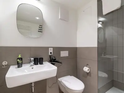 Ein Badezimmer in der Unterkunft Limehome München