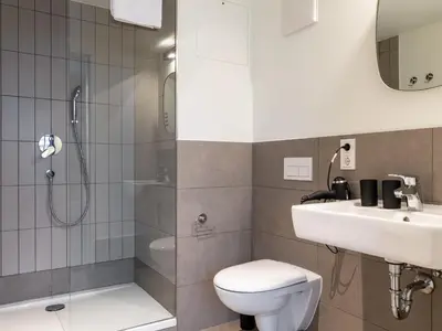 Ein Badezimmer in der Unterkunft Limehome München