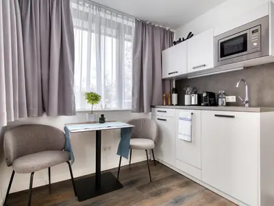 Küche/Küchenzeile in der Unterkunft Limehome München
