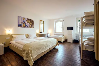 Ein Bett oder Betten in einem Zimmer der Unterkunft THE 4YOU Hostel & Hotel Munich