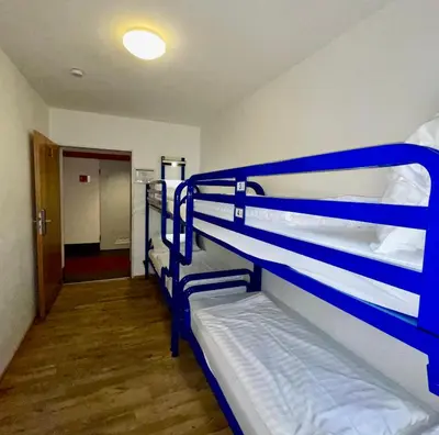 Ein Bett oder Betten in einem Zimmer der Unterkunft THE 4YOU Hostel & Hotel Munich