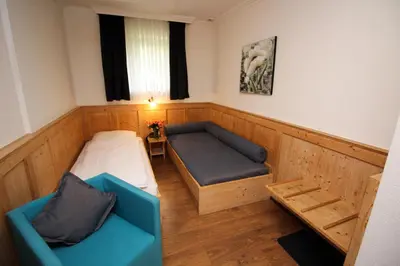 Ein Sitzbereich in der Unterkunft Hotel Heigl