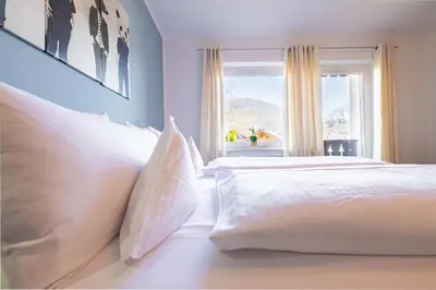 Ein Bett oder Betten in einem Zimmer der Unterkunft Partnach
