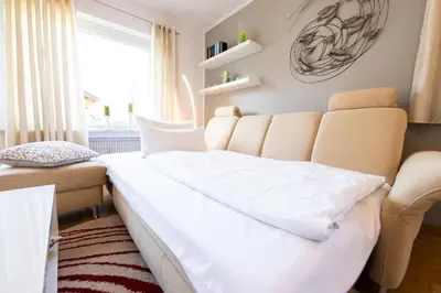 Ein Bett oder Betten in einem Zimmer der Unterkunft Partnach