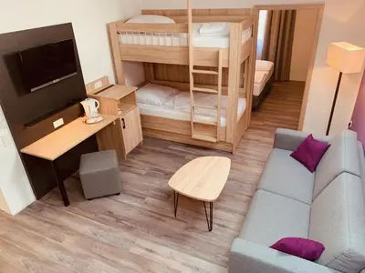 Ein Bett oder Betten in einem Zimmer der Unterkunft Pension Lindenhof