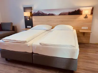 Ein Bett oder Betten in einem Zimmer der Unterkunft Pension Lindenhof