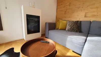 Ein Sitzbereich in der Unterkunft Bungalow mit Terrasse im alpinen Stil