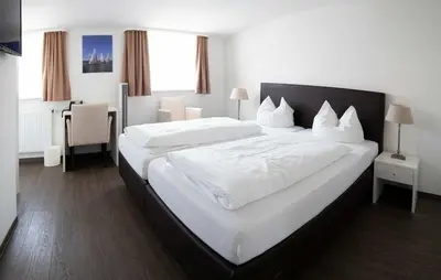 Ein Bett oder Betten in einem Zimmer der Unterkunft Gasthaus Poelt