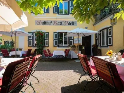 Ein Restaurant oder anderes Speiselokal in der Unterkunft Gasthaus Poelt