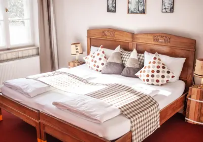 Ein Bett oder Betten in einem Zimmer der Unterkunft Hotel Schloss Blumenthal