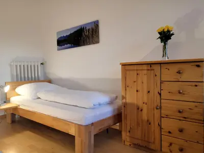 Ein Bett oder Betten in einem Zimmer der Unterkunft Haus Erika 1911 - Wetterstein