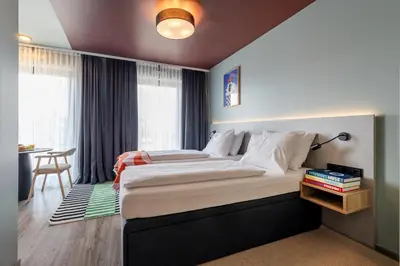 Ein Bett oder Betten in einem Zimmer der Unterkunft kalm stay - munich east