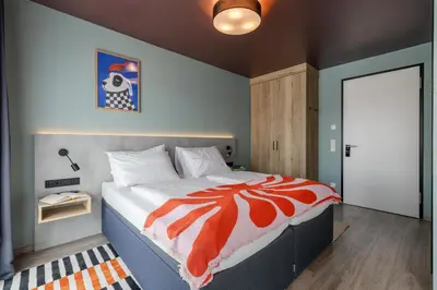 Ein Bett oder Betten in einem Zimmer der Unterkunft kalm stay - munich east
