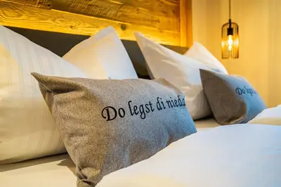 Ein Bett oder Betten in einem Zimmer der Unterkunft Alm-Chalets-Samerberg