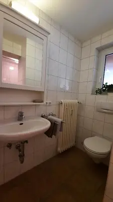 Ein Badezimmer in der Unterkunft Isartaler Hoamat Haus