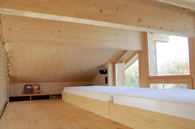 Ein Bett oder Betten in einem Zimmer der Unterkunft Architektenhaus Reischl mit Sauna