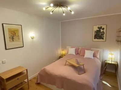 Ein Bett oder Betten in einem Zimmer der Unterkunft Ferienwohnung am Burgberg