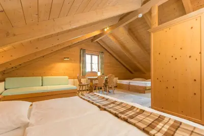 Ein Bett oder Betten in einem Zimmer der Unterkunft Ferienhaus Alp Chalet