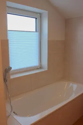 Ein Badezimmer in der Unterkunft Wirtsberg Pension & Cafe