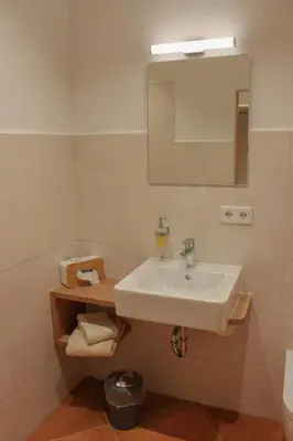 Ein Badezimmer in der Unterkunft Wirtsberg Pension & Cafe