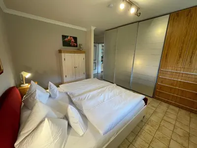 Ein Bett oder Betten in einem Zimmer der Unterkunft Apartment Achentaler FeWo inkl- Spabereich by Interhome